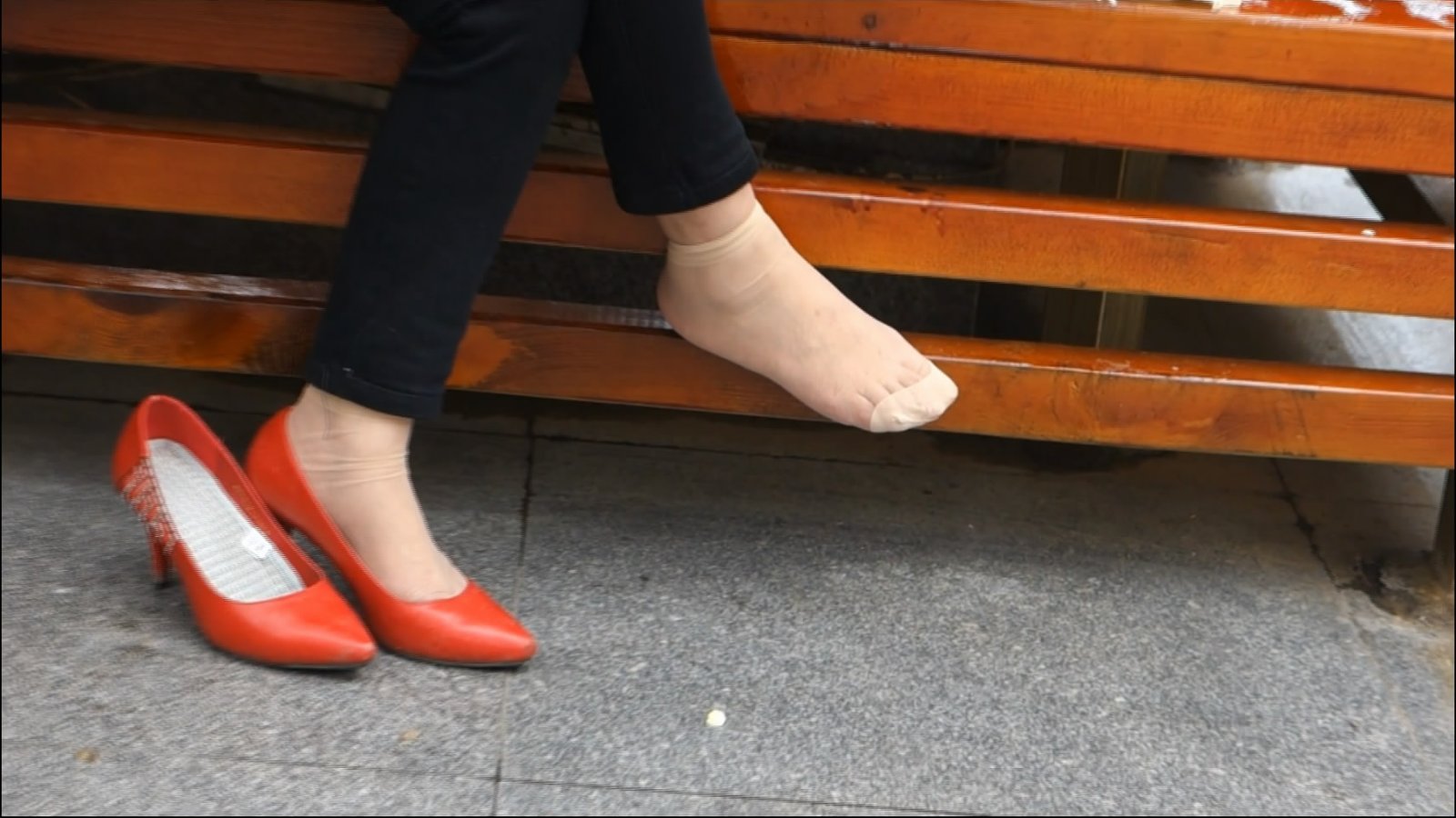 Woman with Nylon Socks Took The Time To Feed Dog.
